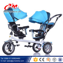 Nuevo modelo bebé gemelos triciclo / precio barato triciclo dos asientos para bebé / doble niños triciclo trike con barra de empuje